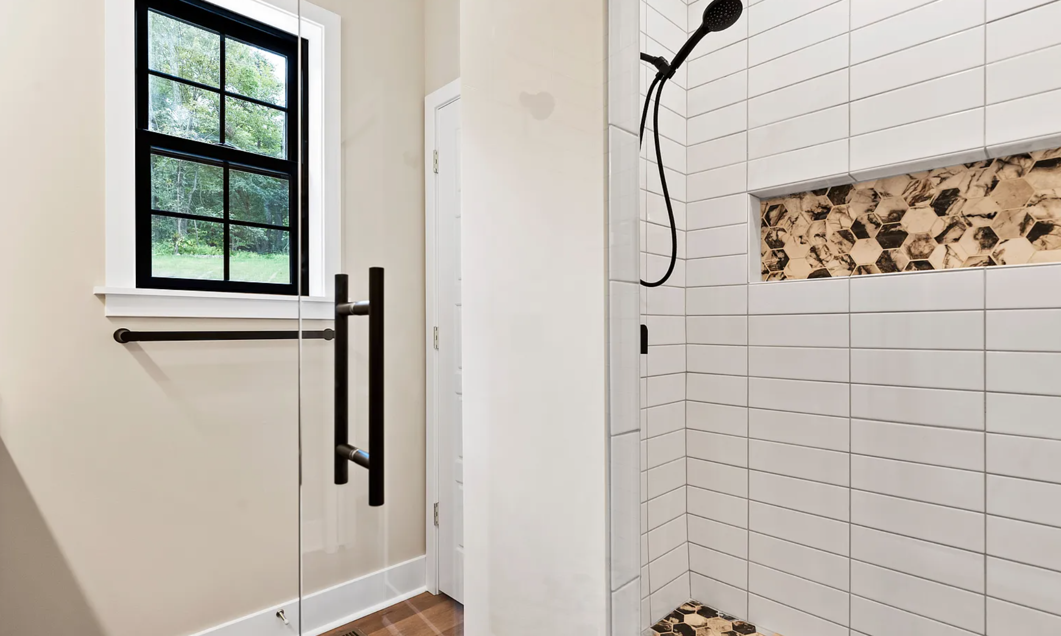 Newly built custom-tiled shower in a Rockville Estates home by Yingst Building Group in Marysville, Pennsylvania
