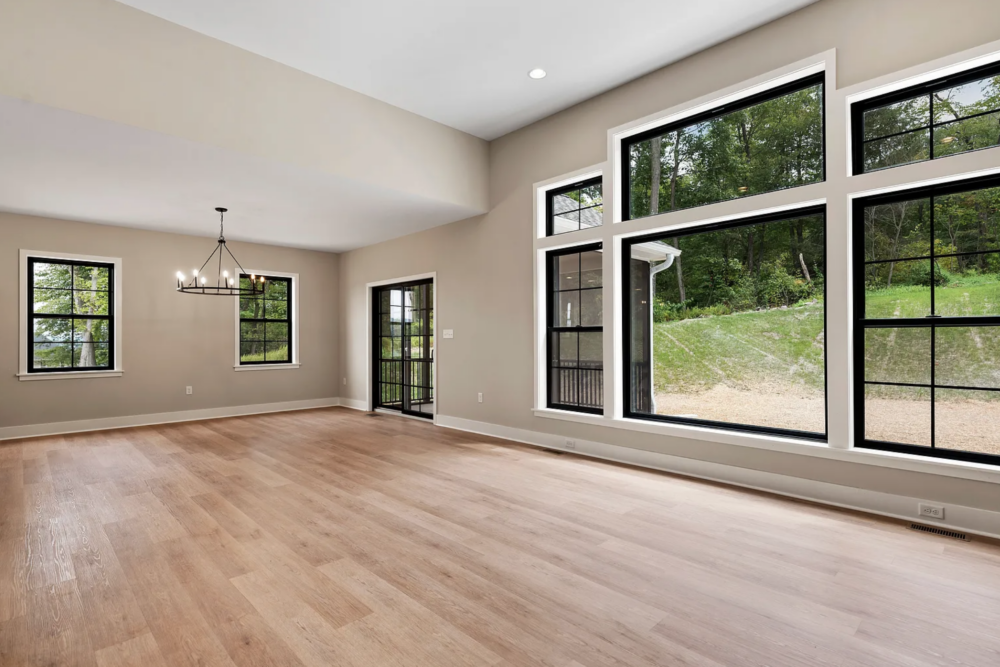 Spacious open floor plan with modern design and natural lighting in a home at Rockville Estates by Yingst Building Group