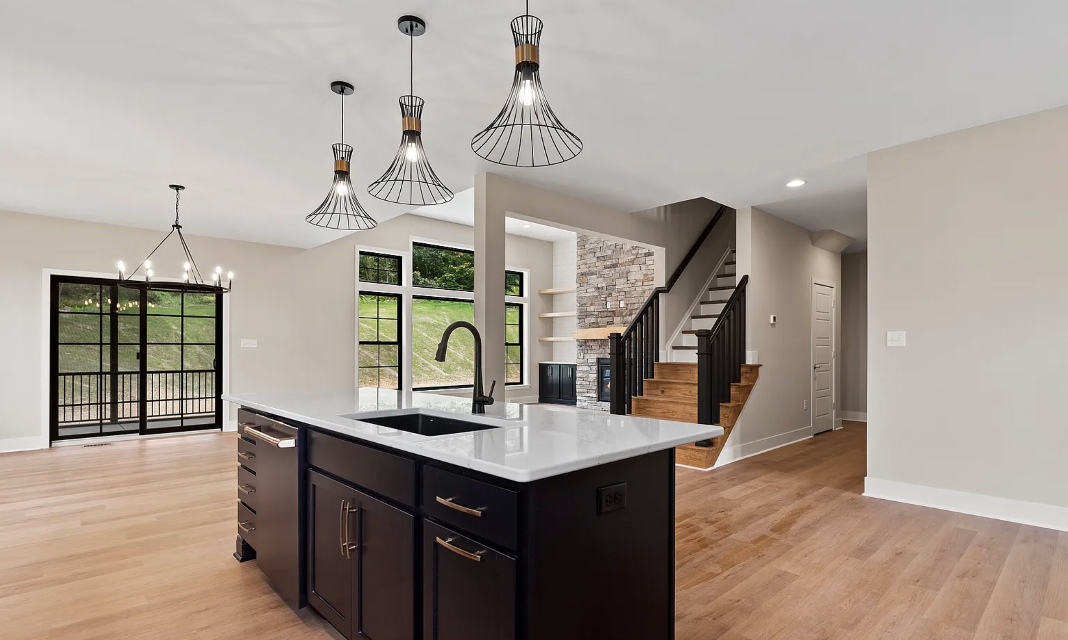 Kitchen island and staircase in a modern home at Rockville Estates, Marysville, PA